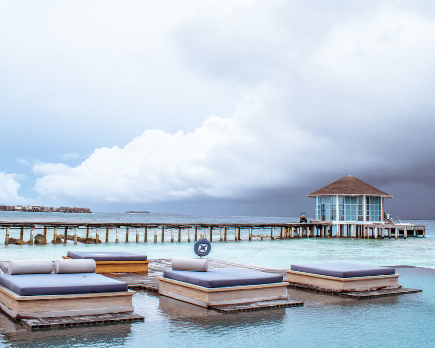 raffles-maldives-pool-sunbed raffles-maldives-pool-sunbed