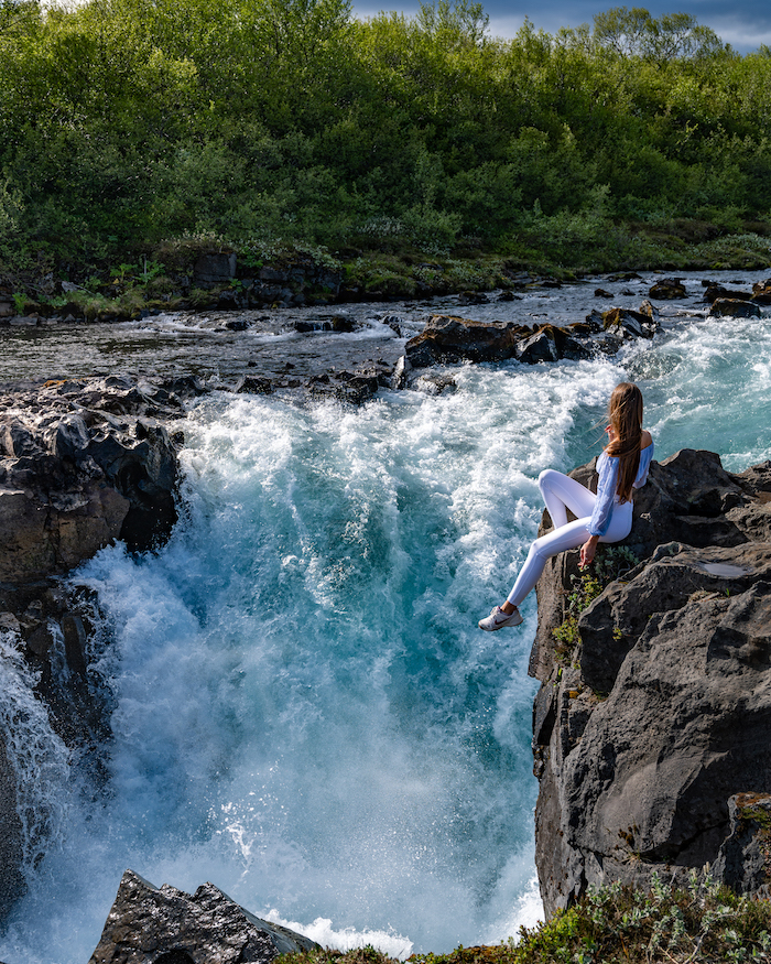 Hlauptungufoss-island-highlights Island Highlights waterfall sitting